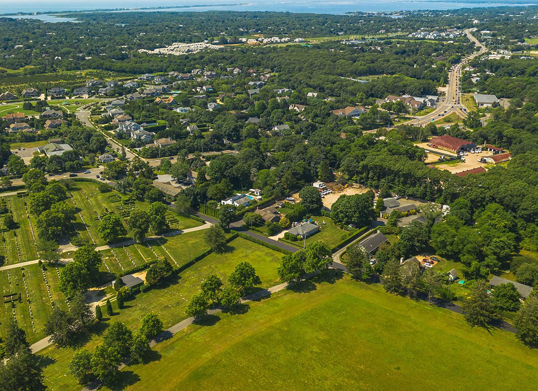 Melville, NY - An Aerial View of the Suburbs in Long Island New York on a Clear Sunny Day